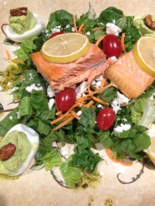 Grilled salmon salad with avocado deviled eggs